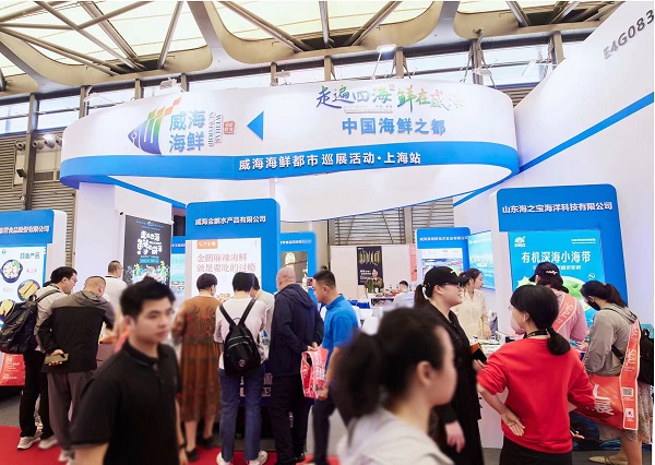 从展馆冰柜走向市场货柜和百姓餐桌威海海鲜在上海“出圈”(图1)